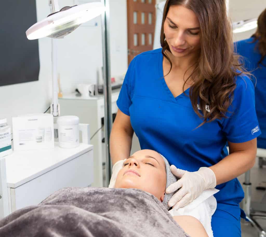 IPL Treatment on Client — Tailored Skin Care Treatments in Benowa, QLD